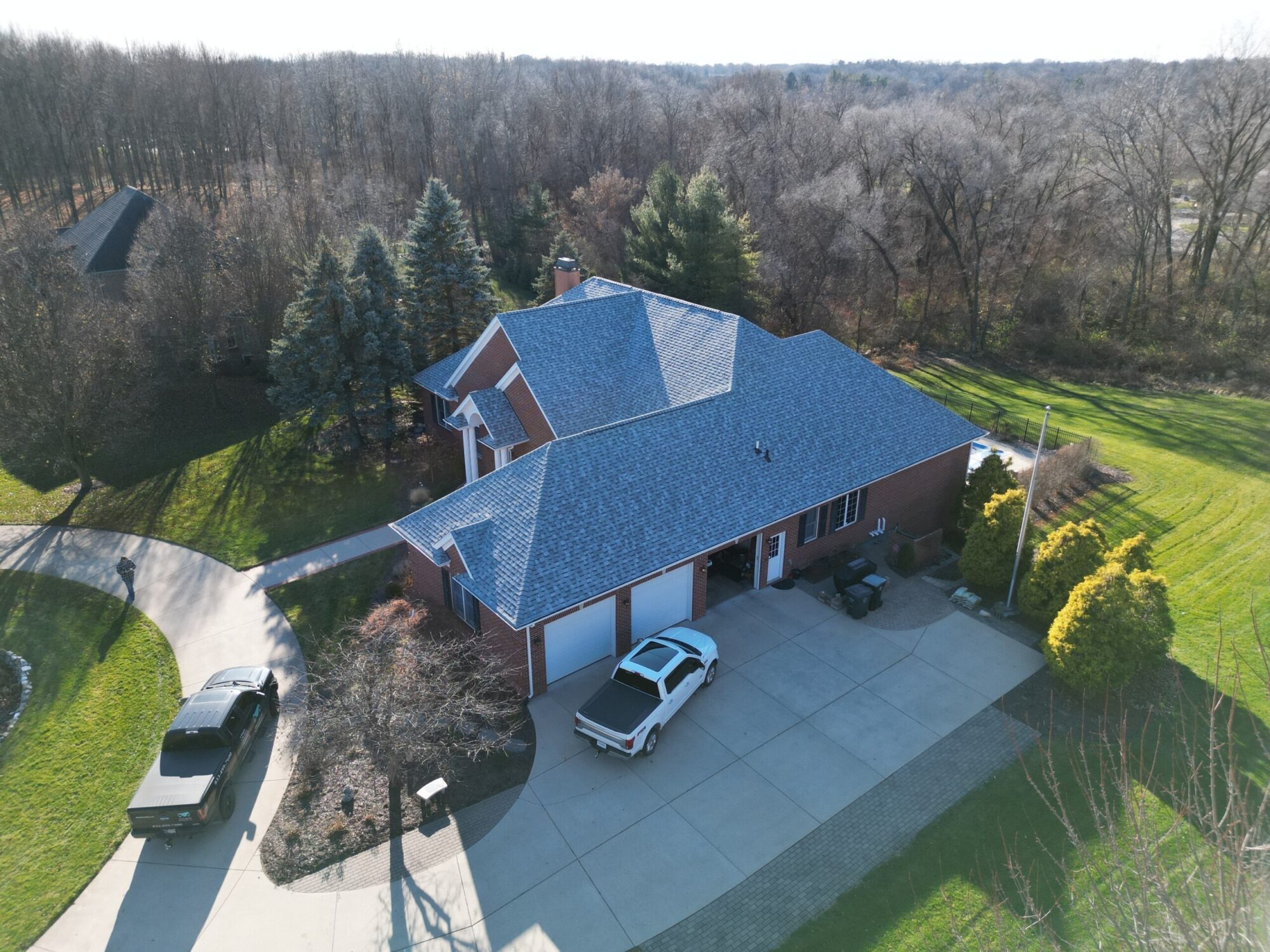 residential shingle roof gray morning side view Nappanee Roofing