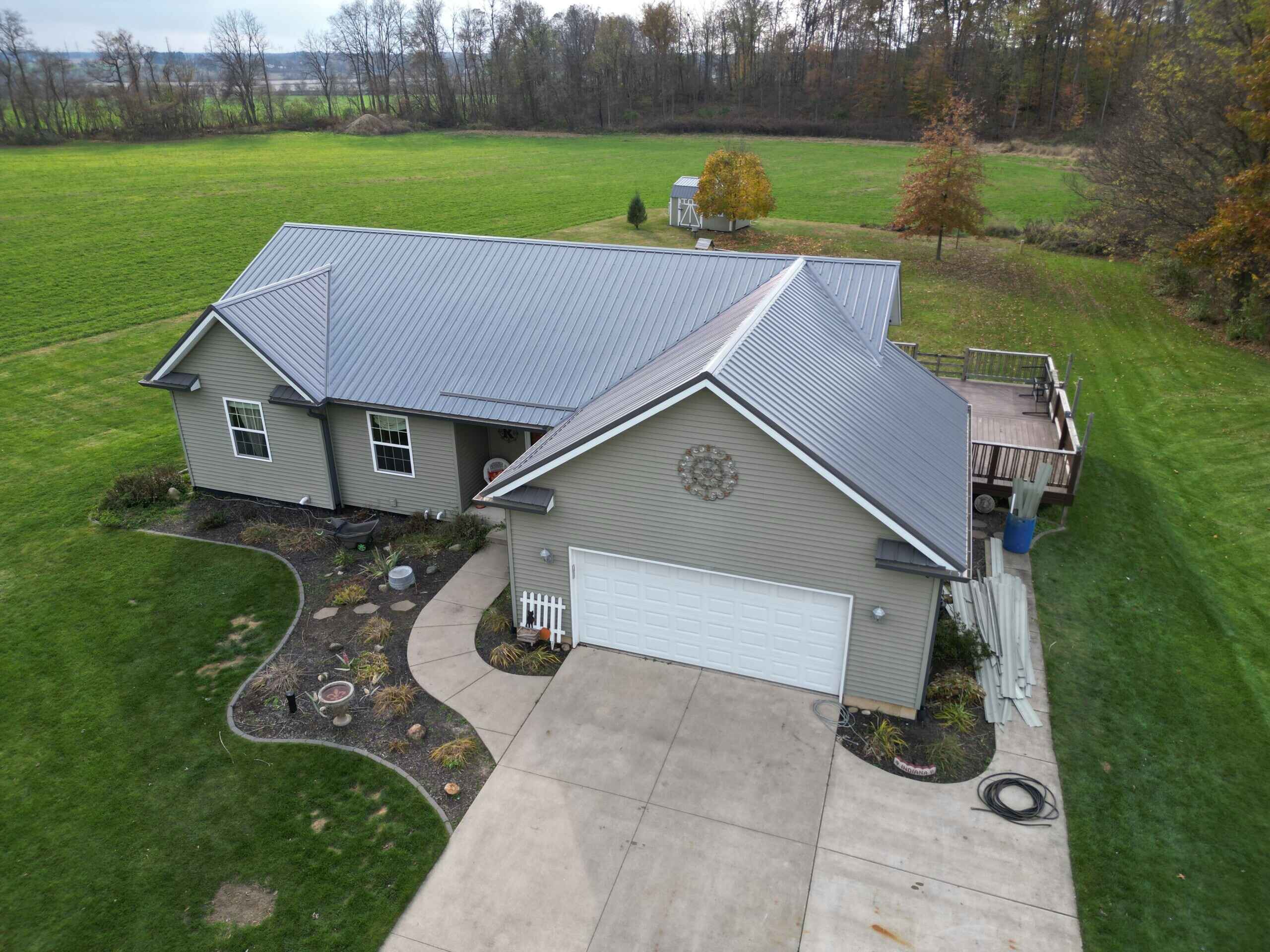aerial shot of metal roofing home gray 2